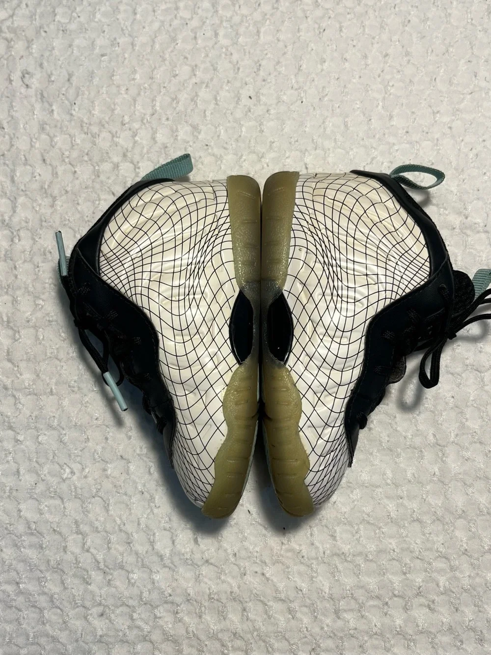 Nike Baby Black and White Grid Wrapped Sneakers with Teal Accents